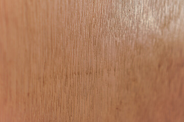 A close-up showcasing the fine lines and warm, earthy tones of wood grain, perfect for adding...
