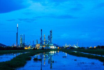 Naklejka premium Oil refinery gas petrol plant industry with crude tank, gasoline supply and chemical factory. Petroleum barrel fuel heavy industry oil refinery manufacturing factory plant. Refinery industry concept