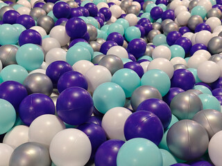 A vibrant assortment of colorful spheres fills the frame, evoking feelings of fun and leisure. The arrangement and tones provide a visually engaging display, perfect for various applications.