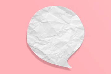 White crumpled speech bubble paper isolated on pink background
