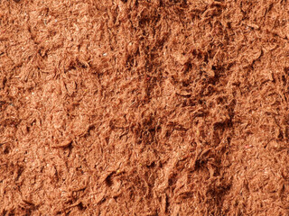 A visually rich backdrop featuring the complex textures of densely packed natural fibers, suited for creative projects requiring warm earthy tones and organic pattern aesthetics.