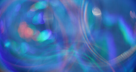 Blur glow texture. Shiny effect. Sparkle multicolored pink blue green purple lens flare turning on dark abstract bokeh light background.
