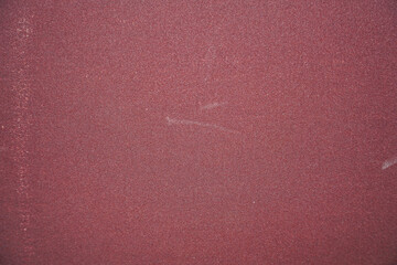 A densely speckled surface showcases a unique blend of texture and depth. The composition evokes...