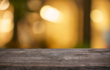 Empty wood table top and blur of restaurant background selective focus product display