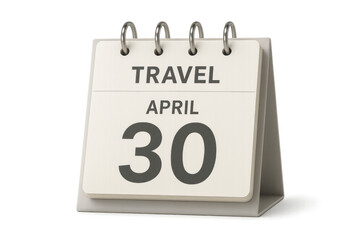 Desktop calendar displaying april 30th with the word travel on top, suggesting travel arrangements and planning