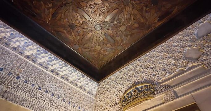 Orbital shot of the ceiling of the Mexuar Hall (council chamber), built in the 14th century, inside the monumental complex of the Alhambra in Granada, Spain