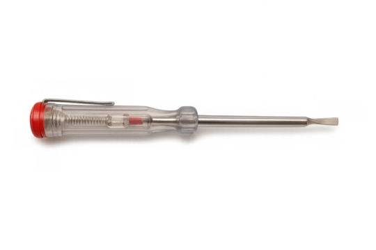 Electrical testing screwdriver resting horizontally, revealing voltage detection against transparent surface