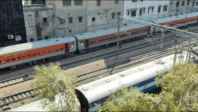 Delhi, India, November 02 2024 - Indian railway express train at departure from Anand Vihar railway station during morning time, Colourful Express train at Delhi railway station