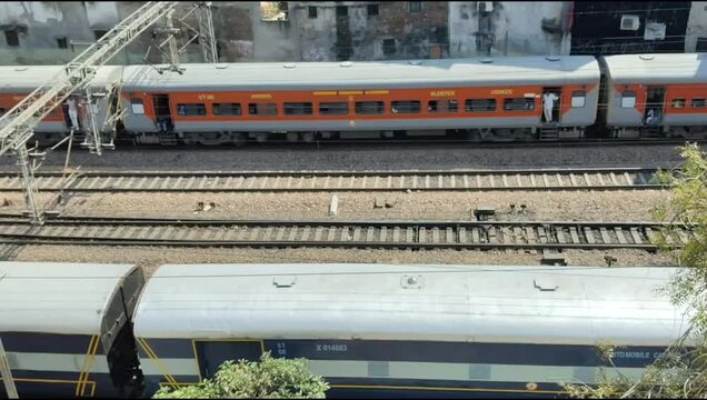 Delhi, India, November 02 2024 - Indian railway express train at departure from Anand Vihar railway station during morning time, Colourful Express train at Delhi railway station