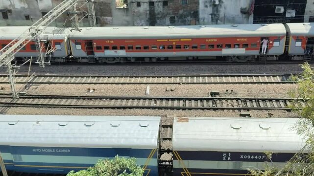 Delhi, India, November 02 2024 - Indian railway express train at departure from Anand Vihar railway station during morning time, Colourful Express train at Delhi railway station