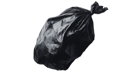 A dark, crumpled plastic garbage bag, tied at the top, isolated on a black background