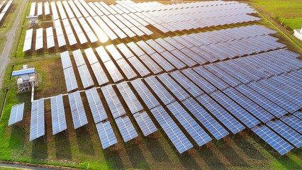 The solar panels, spread across the landscape, represent a sustainable approach to energy...