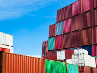 Cargo ship container goods export import international transport on blue sky background, warehouse...
