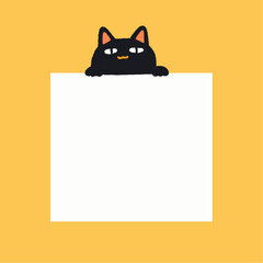 a black cat sitting on top of a white sign