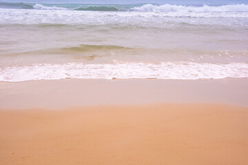 Nature of the beach and sea Summer with sunshine, sandy beaches, clear blue waters sparkling against the blue sky. On an island with good ecology and environment Background for summer vacation