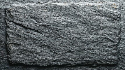 Close-up view of a dark gray stone slab.