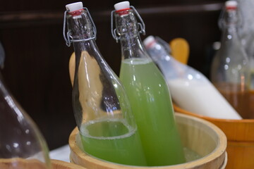 cucumber drink in a bottle in a buffet beautiful presentation. Detox Juice. eyes of the body healthy food vegetable drinks celery green cucumber