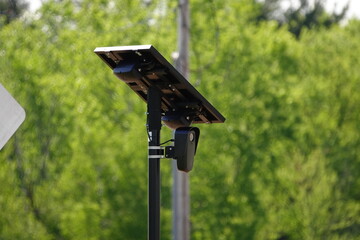 Flock safety police law enforcement license plate reader set up outside to help catch vehicle...