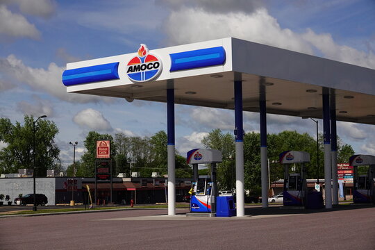 Amoco fuel station sign on a fuel station building advertising to the community.