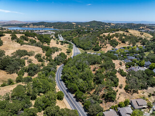 Aerial views of the San Marin neighborhood and surrounding hills in Marin County, California. Suburban homes, winding roads, and oak-dotted golden hills define the scenic North Bay landscape.