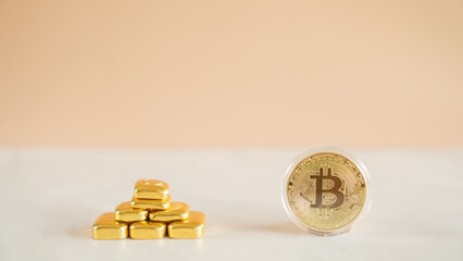 Gold bullion and bitcoin, digital gold, assets comparison for investment concept
