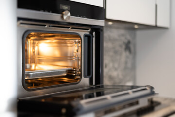 Modern home kitchen oven blurred background