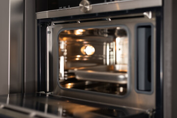 Modern home kitchen oven blurred background