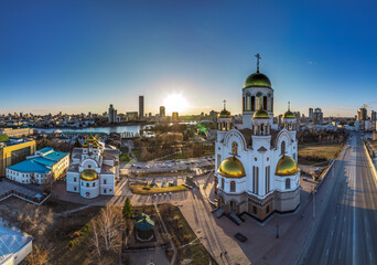 Early spring or autumn Yekaterinburg and Temple on Blood in clear sunset. Aerial view of...