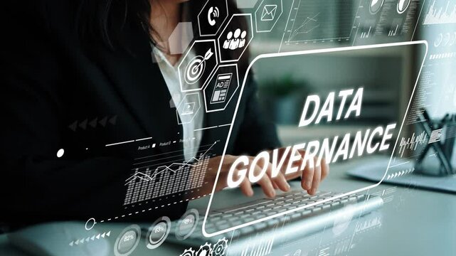 Businesswoman Typing on Keyboard with Data Governance Graphics and Icons in Modern Office Environment. Asymptotic smart data analytic. - Powered by Adobe