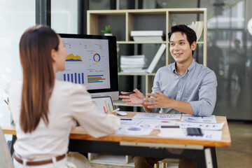 Financial Business Team analyze the graph of the company's performance to create profits and growth, Market research reports and income statistics, Financial and Accounting concept.	