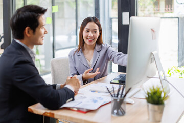 Asian business Team working at office with documents on his desk, doing planning analyzing the financial report, business plan investment, finance analysis concept	