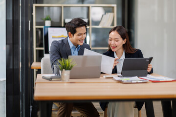 Business team working at office with documents on his desk, doing planning analyzing the financial...