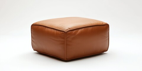 Obraz premium Compact leather ottoman with smooth finish in tan on white background