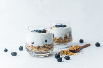 Yogurt granola parfaits topped with fresh blueberries