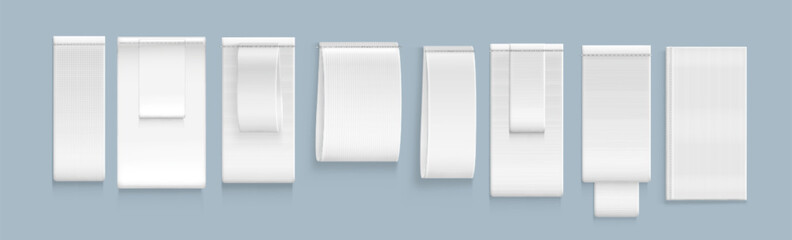 Set of blank beige clothing labels and tags mockup templates isolated on white background. Vertical folded and flat empty fabric ribbons and textile badges. 3d vector for garment logo branding.