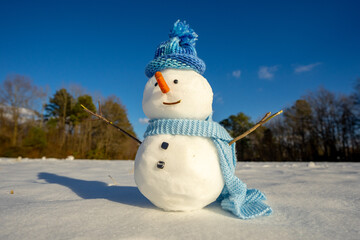 Snowman on winter card. Playful snowman outdoors. Winter holiday. Snowman in snowfall. Winter...