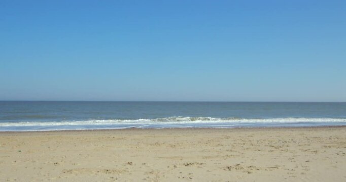 Wide shot looking out to sea at Walcott Beach