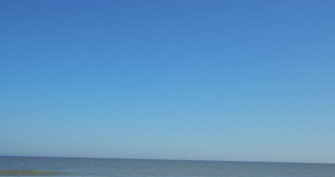 tilting up shot of Walcott Beach