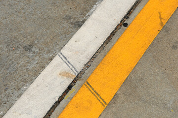 Fototapeta premium yellow line on asphalt