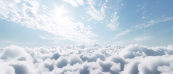 Sunlight shining through fluffy clouds. A scenic view of bright sun rays filtering through thick cumulus clouds against a clear blue sky