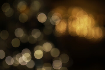 Abstract Bokeh Lights Background in Black and Gold for Festive and Elegant Designs