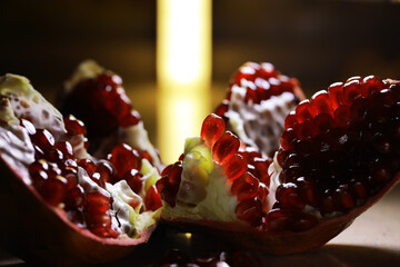 Fresh Juicy Pomegranate Seeds Close-Up with Dramatic Lighting
