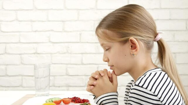 Child Praying Before Eating Breakfast in Kitchen, Kid Preparing Eat Meal, Girl Religious View, Christian Customs, Practices