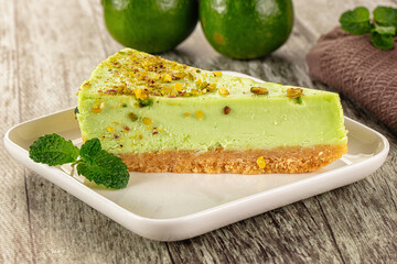 Green pistachio cheesecake served mint