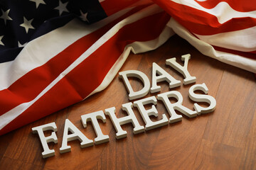 Patriotic Father's Day Celebration with American Flag on Wooden Background