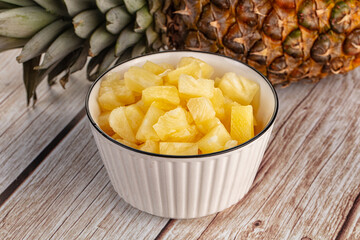 Sweet canned pineapple fruit pieces