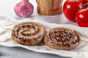 Grilled beef round circle sausages