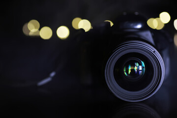 Close-Up of Camera Lens with Bokeh Lights in the Background for Photography Enthusiasts