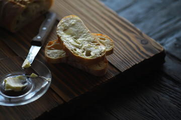 Freshly Sliced Bread with Butter on Rustic Wooden Table - Breakfast, Artisan Bakery, Rustic Food