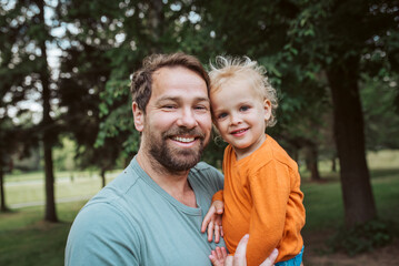 Portrait of dad and child enjoying time together